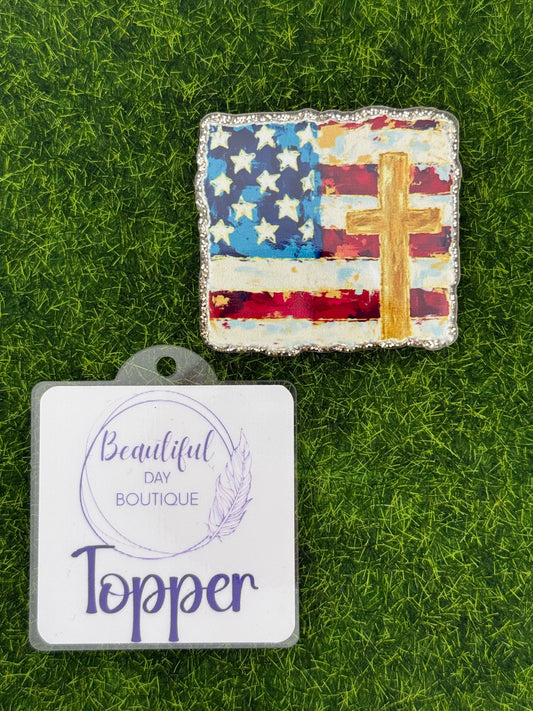 Rugged cross and flag