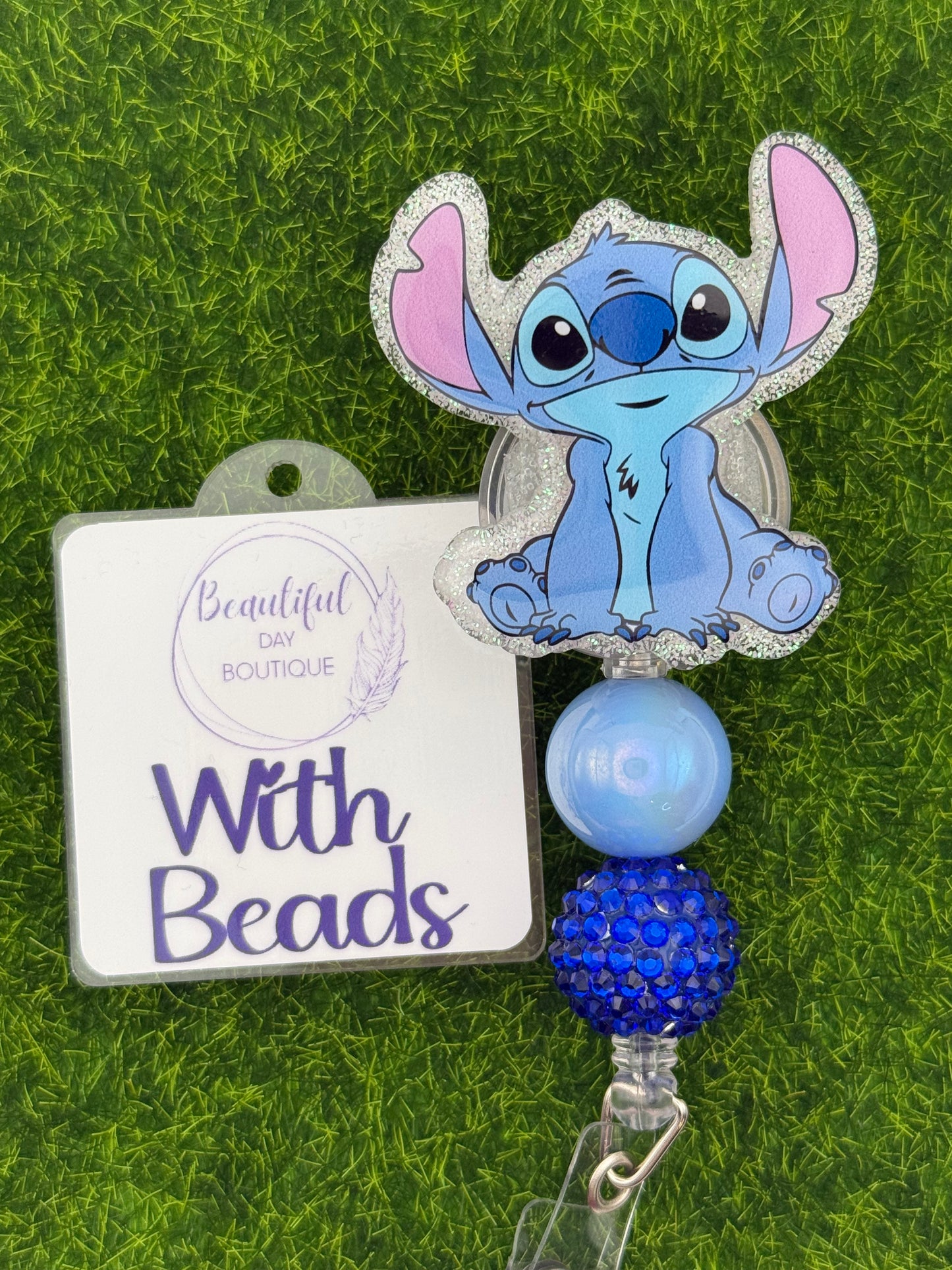 Blue alien sitting