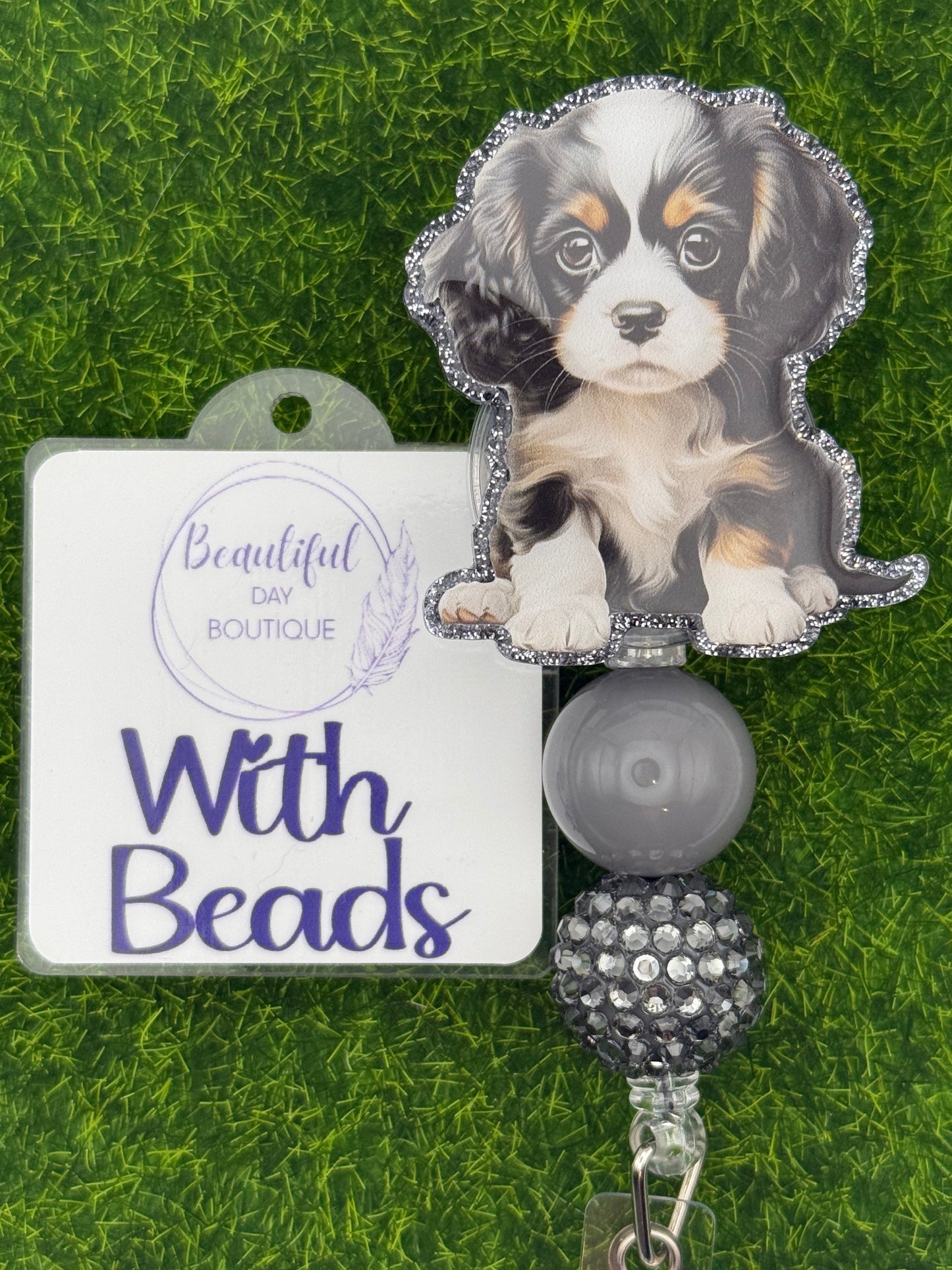 Tri color cavalier King Charles pup