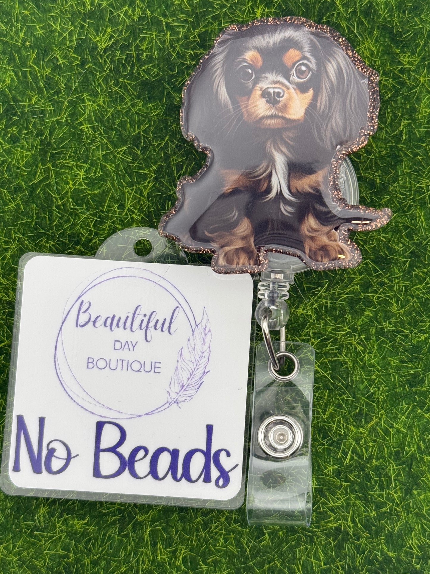 Black/tan cavalier King Charles pup