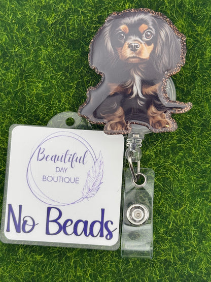 Black/tan cavalier King Charles pup