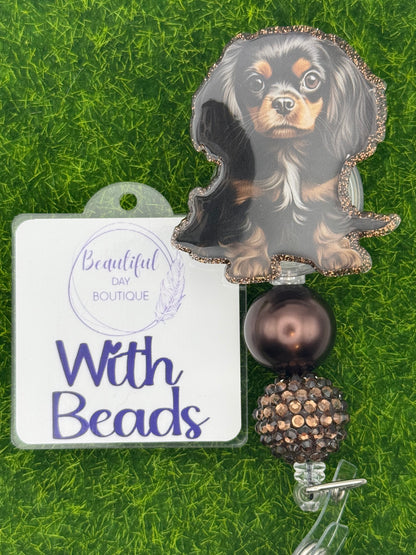 Black/tan cavalier King Charles pup