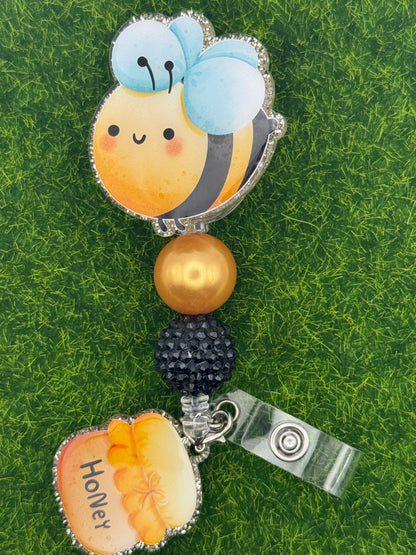 Bee/honey pot-full reel with charm