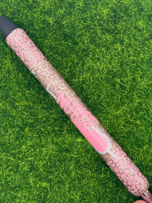 Nurse on rose gold pen