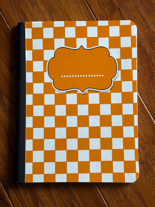 Orange/white checkered notebook-wide ruled