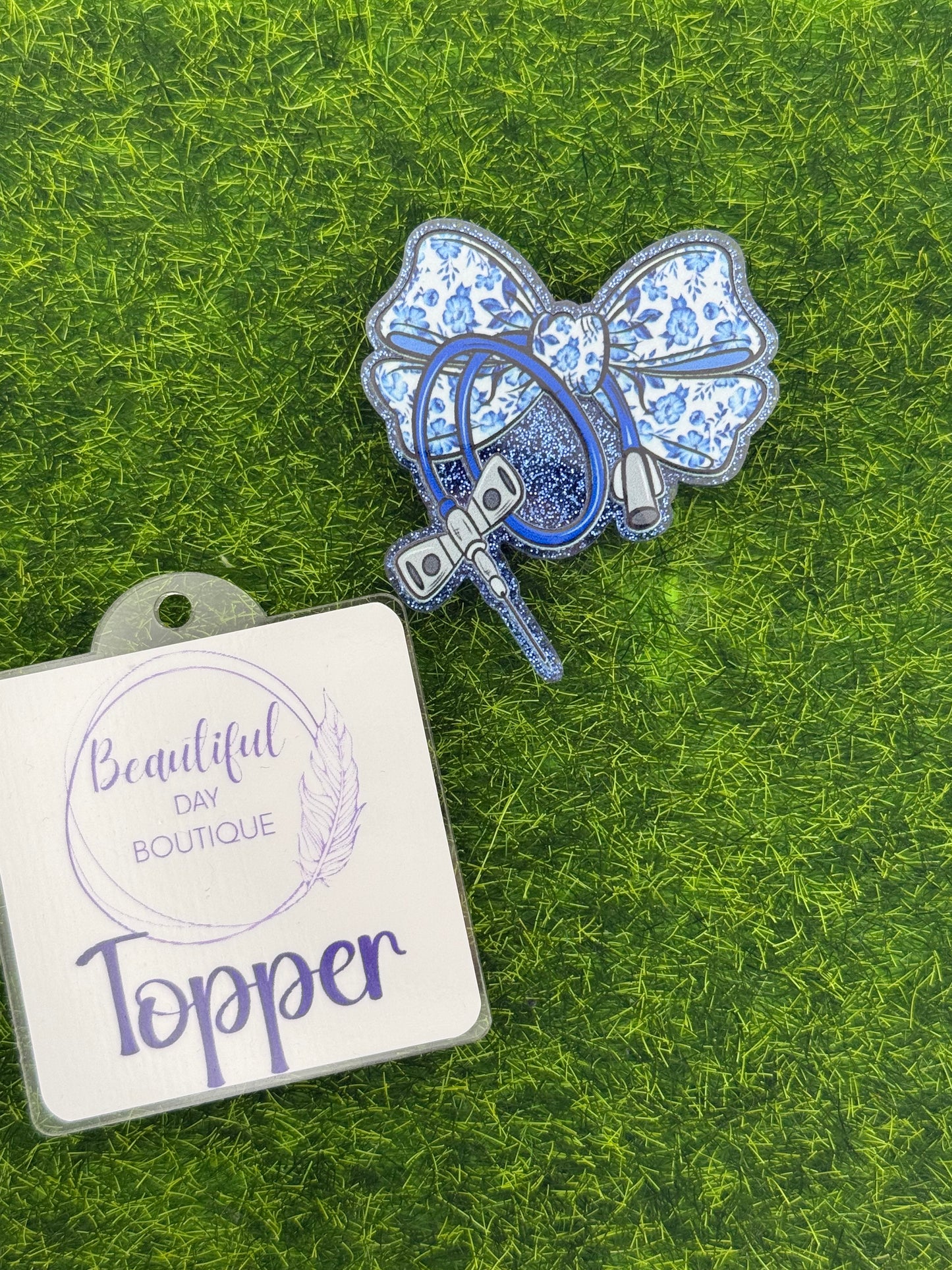 Butterfly needle blue bow