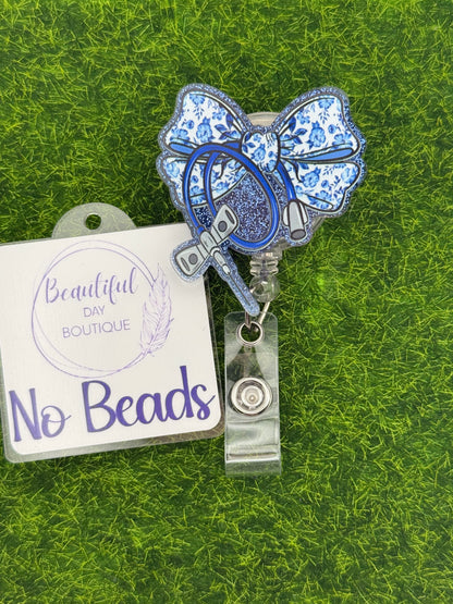 Butterfly needle blue bow