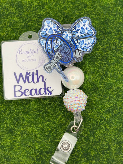 Butterfly needle blue bow