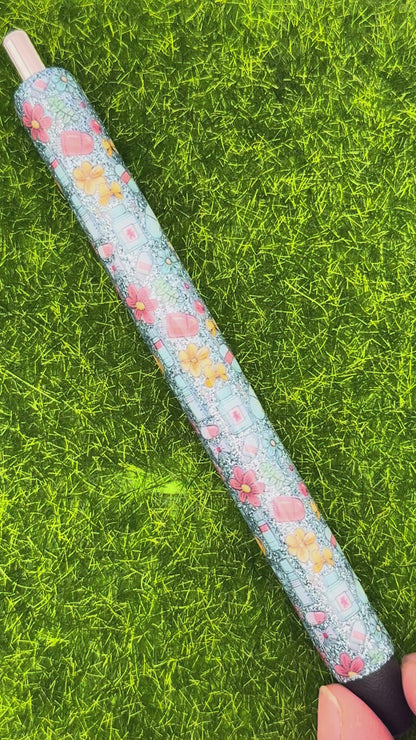 Floral meds on blue glitter-inkjoy pen
