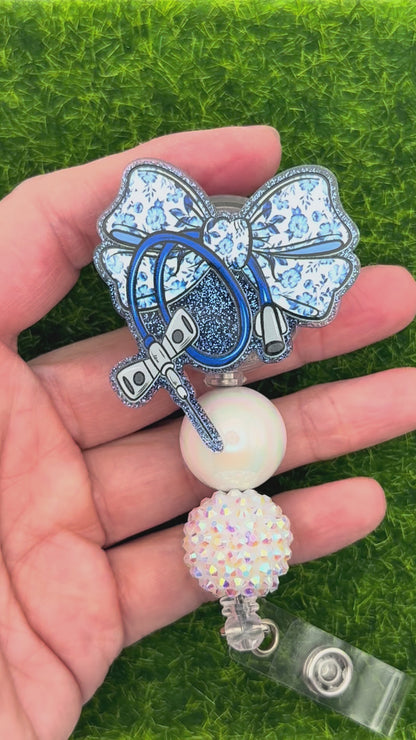 Butterfly needle blue bow